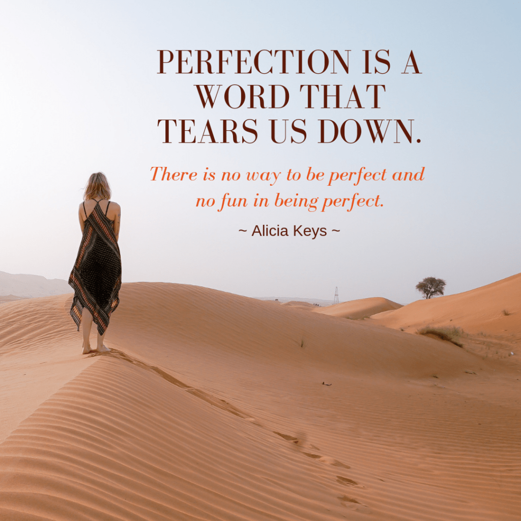 woman walking alone on a sand dune