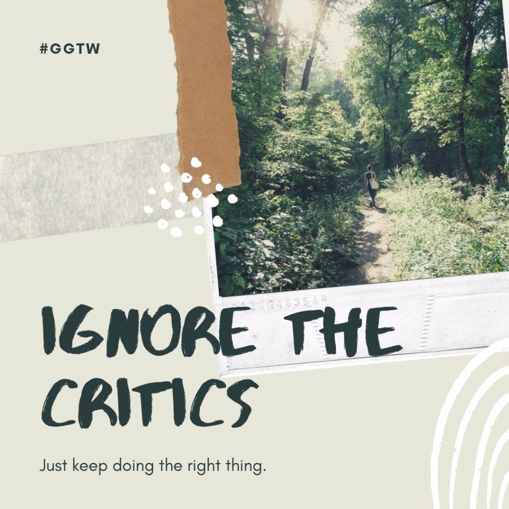 Woman walking on a forest path.